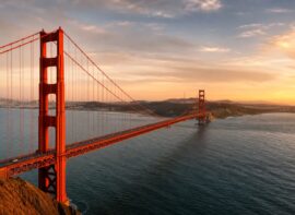 Golden Gate Bridge over San Francisco Bay at sunset.